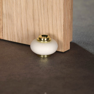 Gulvdørstopper Thirard i messing, 22×30 mm